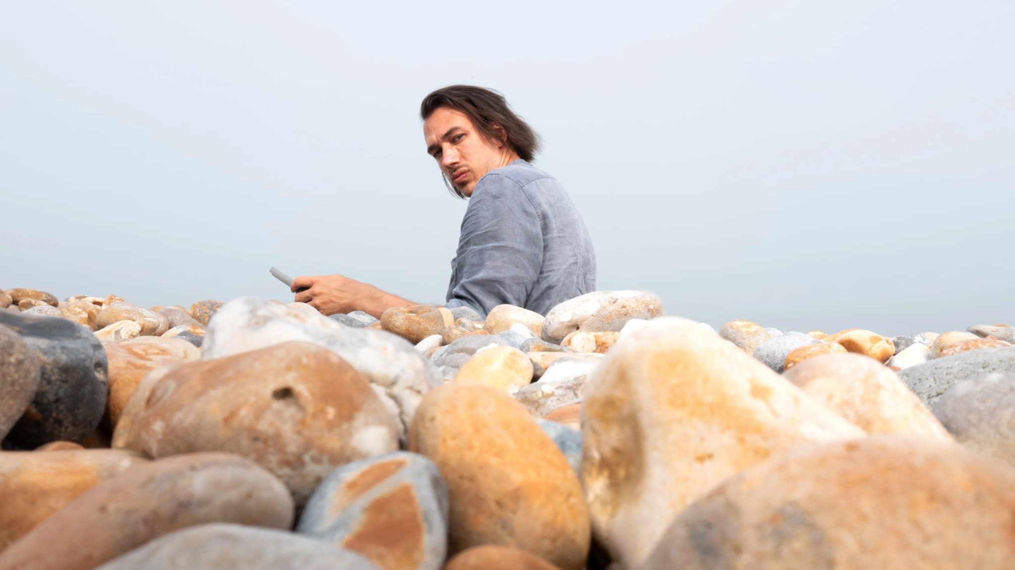 Professional capturing a heritage artifact using accessible scanning equipment